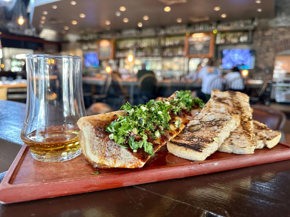 Whiskey Cake's new Bone Marrow Booze Luge.