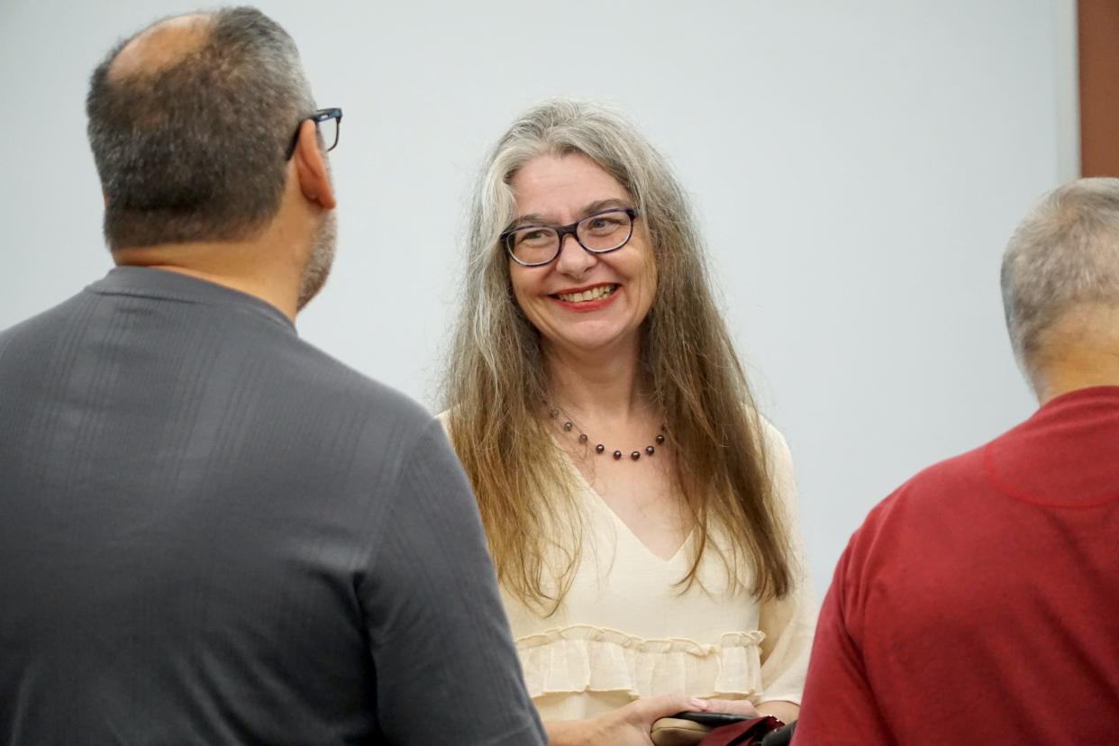 North Regional Branch Manager Cara Chance smiles after surviving an attempt by Lafayette Public Library Board of Control members to fire her at a board meeting on Monday, July 25, 2022.