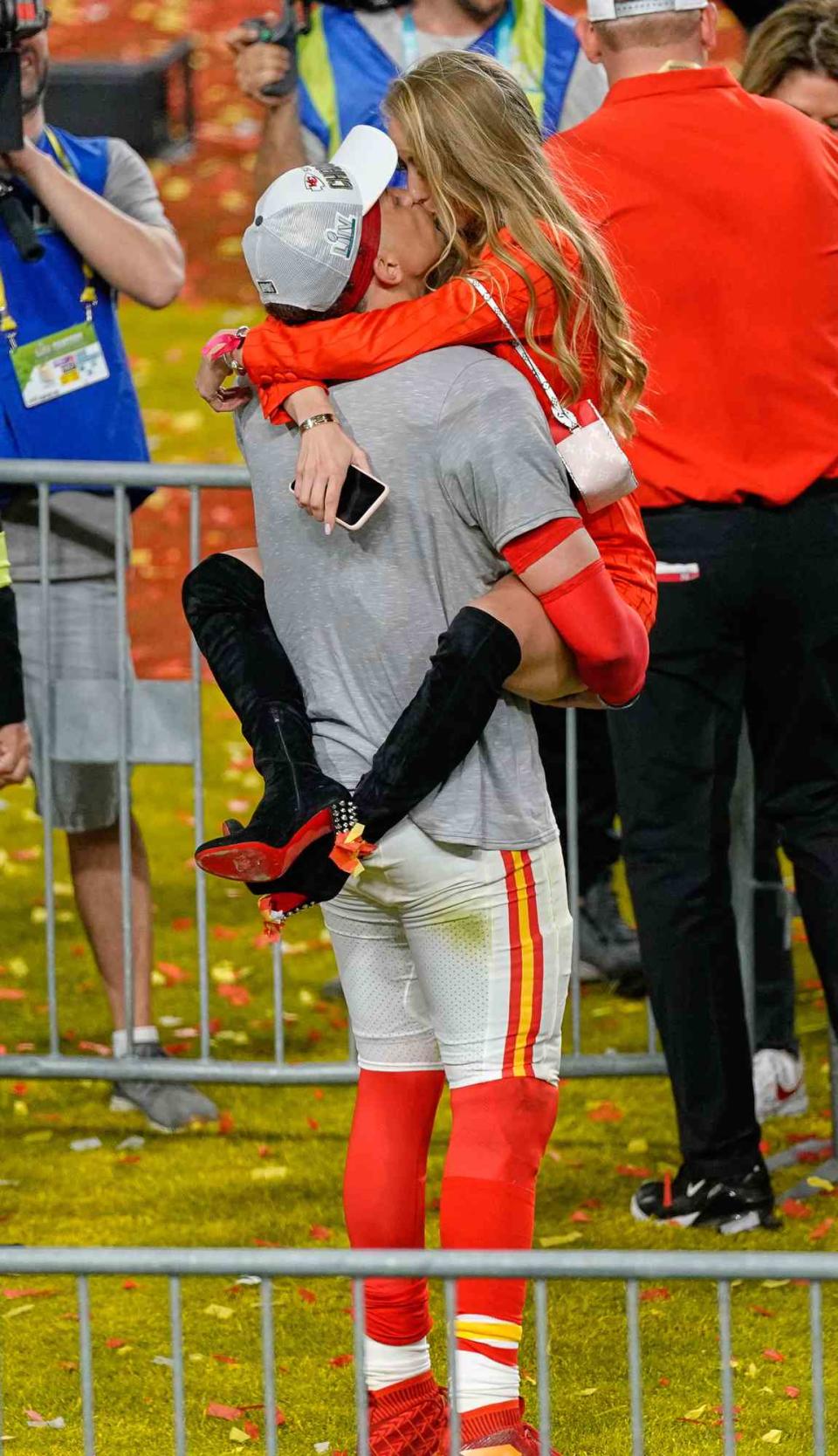 Kansas City Chiefs quarterback Patrick Mahomes (15) celebrates with girlfriend and high school sweetheart Brittany Matthews after game action during the Super Bowl LIV game between the Kansas City Chiefs and the San Francisco 49ers on February 2, 2020 at Hard Rock Stadium, in Miami Gardens, FL
