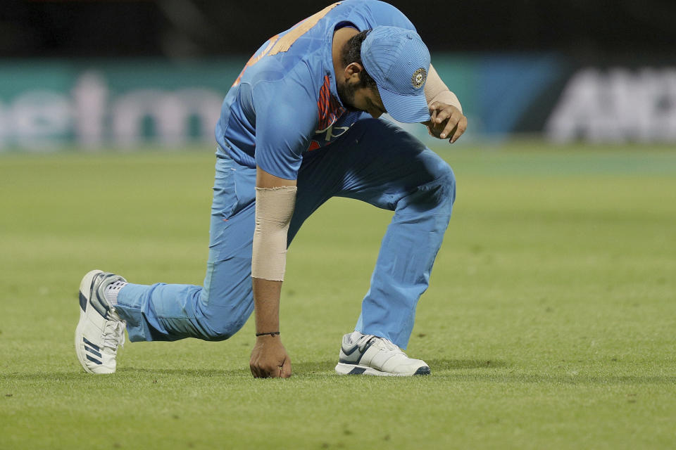 India's Rohit Sharma reacts after dropping a catch during their twenty/20 cricket international against New Zealand at Seddon Park in Auckland, New Zealand, Sunday, Feb. 10, 2019. (AP Photo/David Rowland)