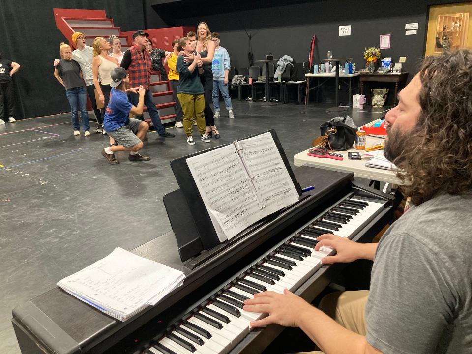 Music director Nate Venet plays the keyboard during a rehearsal Nov. 1, 2023 in South Burlington for Lyric Theatre's production of "The Prom."