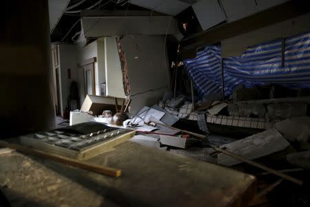 A view is seen inside a damaged building after an earthquake in Tainan, southern Taiwan, February 6, 2016. REUTERS/Tyrone Siu