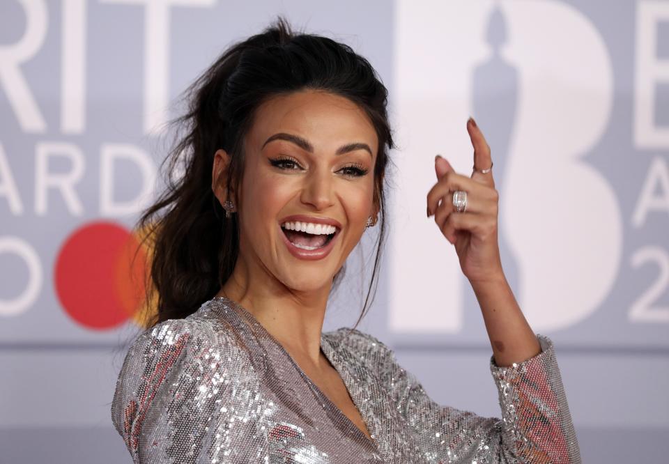 Actress Michelle Keegan poses for photographers upon arrival at Brit Awards 2020 in London, Tuesday, Feb. 18, 2020.(Photo by Vianney Le Caer/Invision/AP)