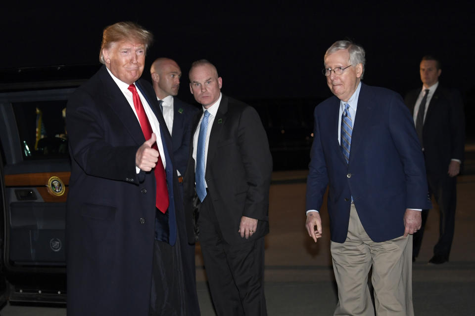 President Donald Trump arrives at Blue Grass Airport in Lexington, Ky., Monday, Nov. 4, 2019, with Senate Majority Leader Mitch McConnell, for a campaign rally. (AP Photo/Susan Walsh)
