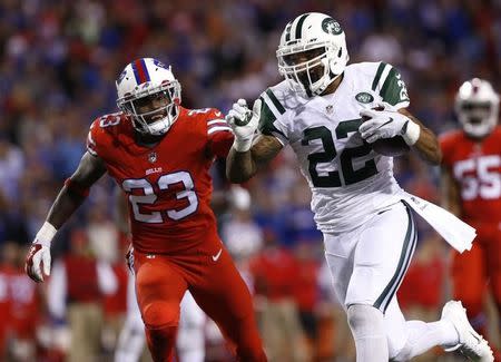 Sep 15, 2016; Orchard Park, NY, USA; New York Jets running back Matt Forte (22) runs for a touchdown as Buffalo Bills strong safety Aaron Williams (23) pursues during the second half at New Era Field. The Jets beat the Bills 37-31. Mandatory Credit: Kevin Hoffman-USA TODAY Sports