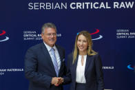 FILE - European Commission Vice President Maros Sefcovic, left, shakes hands with Serbia's Mining and Energy Minister Dubravka Djedovic Handanovic after a signing ceremony at the Serbia Palace in Belgrade, Serbia, on July 19, 2024. (AP Photo/Darko Vojinovic, File)