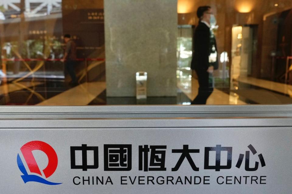 Trading in shares of China’s Evergrande resumed after 17 days on Thursday  (AP)