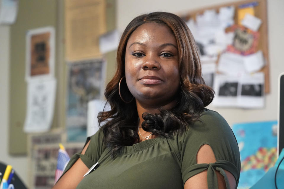 Dana Anthony is seen at her workplace at The Daily Tar Heel newspaper in Chapel Hill, N.C., Tuesday, April 13, 2021. Anthony was rejected after two speparate HireVue interviews for other jobs recently. The pandemic has heightened demand for online services that interview job applicants remotely and use artificial intelligence to assess their skills. But the technology also raises questions about whether computers can accurately judge a person's character traits and emotional cues. (AP Photo/Gerry Broome)