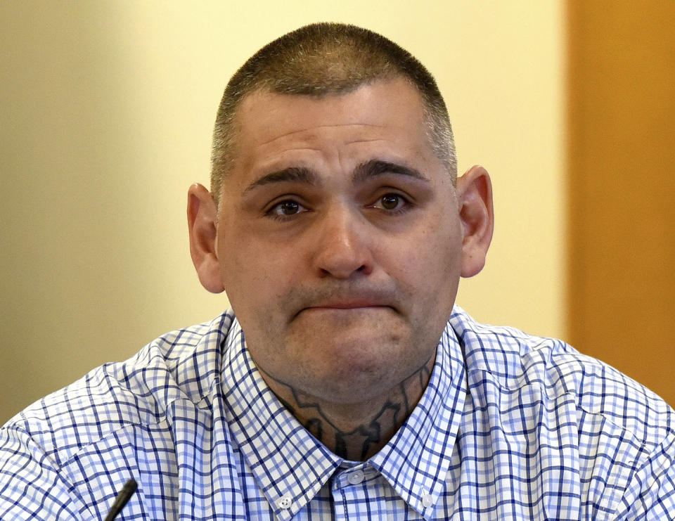 Michael Gilpatrick of Nashua, a former youth detention center resident, fights back tears as testifies during a civil trial seeking to hold the state accountable for alleged abuse at the Sununu Youth Services Center, formerly called the Youth Development Center, Wednesday, April 17, 2024, at Rockingham County Superior Court in Brentwood, N.H. (David Lane/Union Leader via AP)