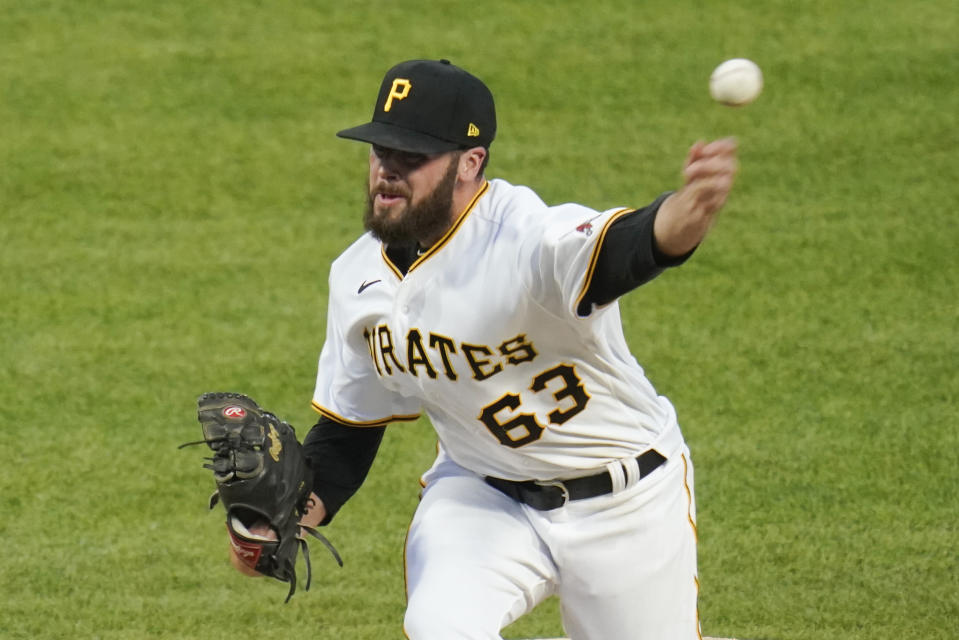 Pittsburgh Pirates' Cam Alldred pitches against the Cincinnati Reds during the sixth inning of a baseball game Thursday, May 12, 2022, in Pittsburgh. (AP Photo/Keith Srakocic)