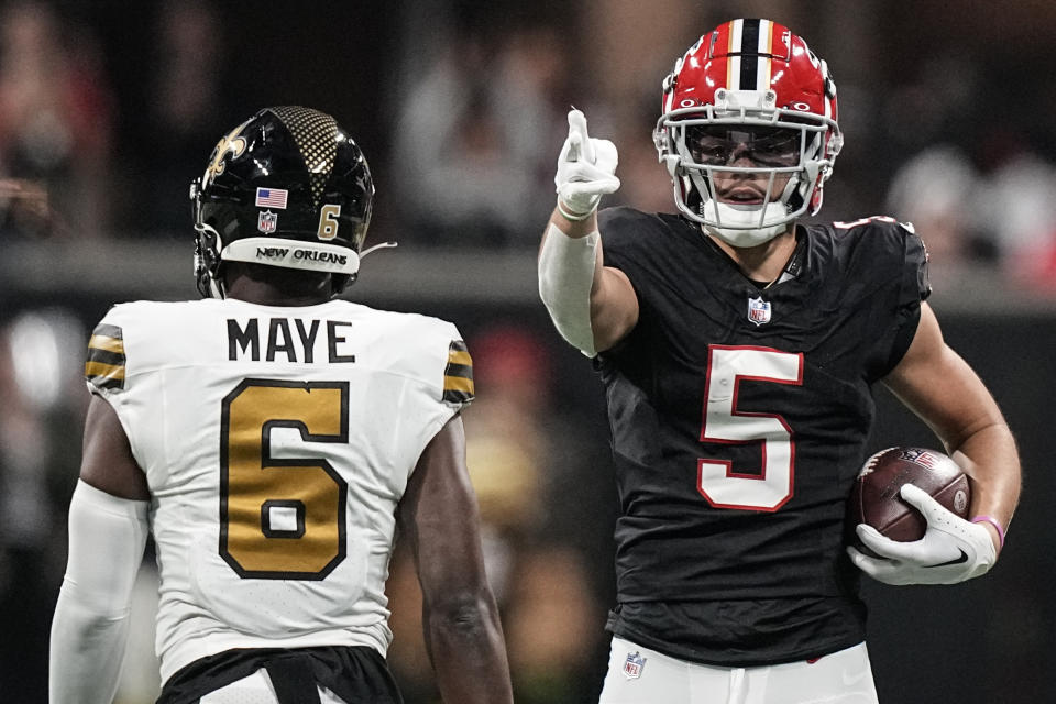 Atlanta Falcons wide receiver Drake London (5) signals a first down against the New Orleans Saints during the first half of an NFL football game, Sunday, Nov. 26, 2023, in Atlanta. (AP Photo/Brynn Anderson)