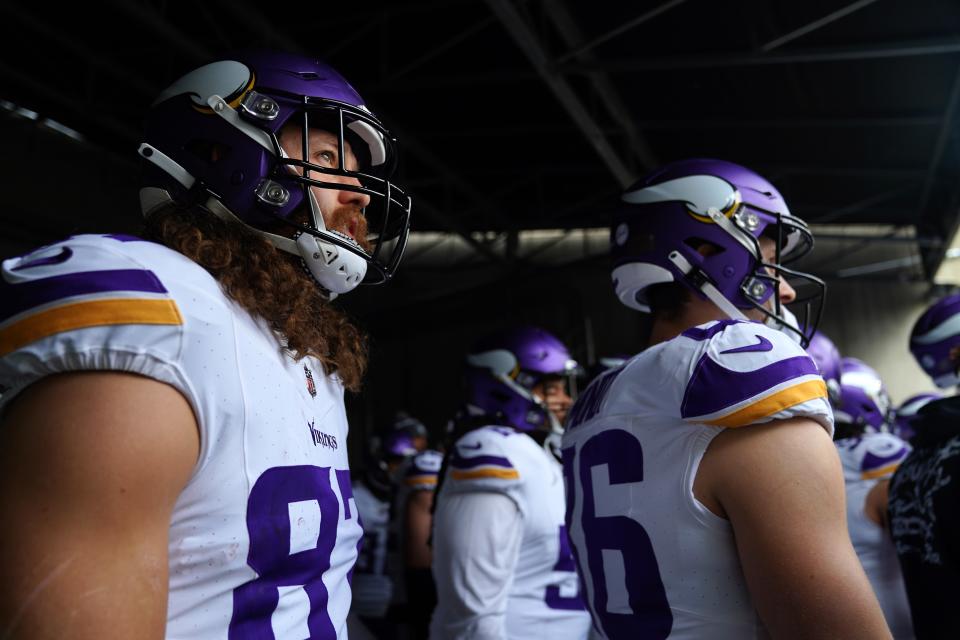 T.J. Hockenson, left, leads all NFL tight ends in receptions and yards.