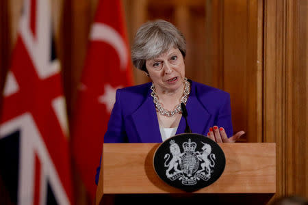 British Prime Minister Theresa May speaks as she takes part in a news conference with Turkey's President Recep Tayyip Erdogan, after their meeting at 10 Downing Street in London, Britain, May 15, 2018. Matt Dunham/Pool via REUTERS