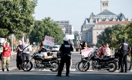 Climate change activists call block key buildings and roads in Washington D.C.