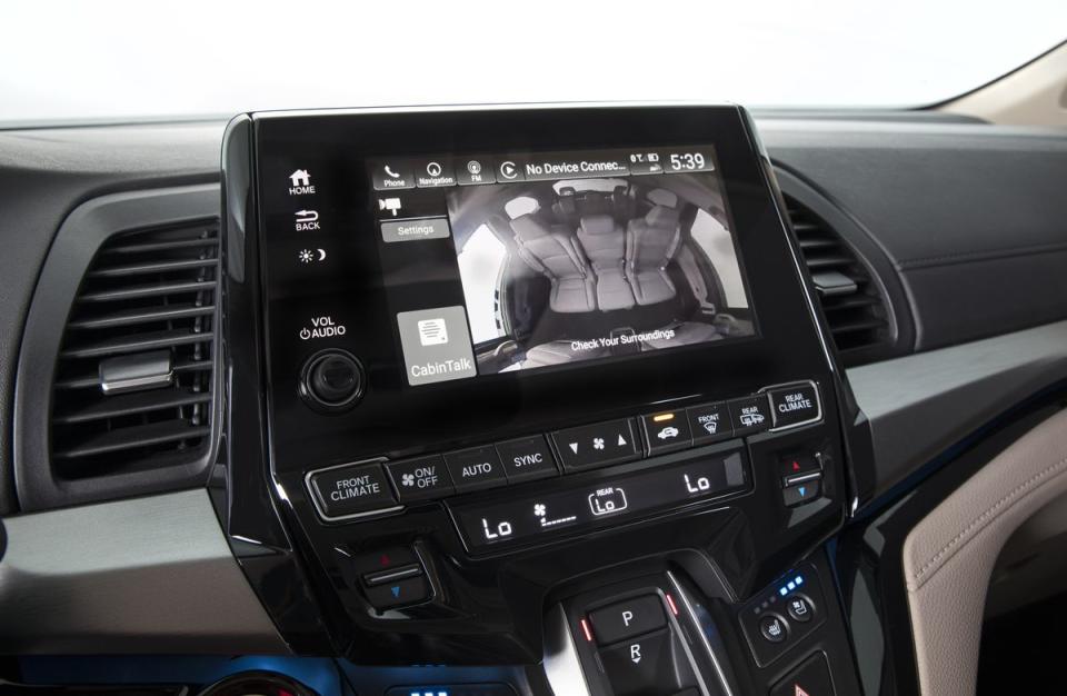 <p>An available camera mounted above the second row sends a wide-angle feed of what’s going on back there to the front seat center screen. This feature, called CabinWatch, includes the ability to zoom in on individual seating positions in the second or third rows and infrared-light capability for nighttime viewing. Another new feature, CabinTalk, is the airplane-like ability to broadcast an announcement through the headphones, which also pauses what’s playing on the screen.</p>