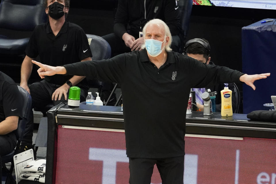San Antonio Spurs head coach Gregg Popovich directs his team against the Minnesota Timberwolves in the second half of an NBA basketball game Saturday, Jan. 9, 2021, in Minneapolis. (AP Photo/Jim Mone)