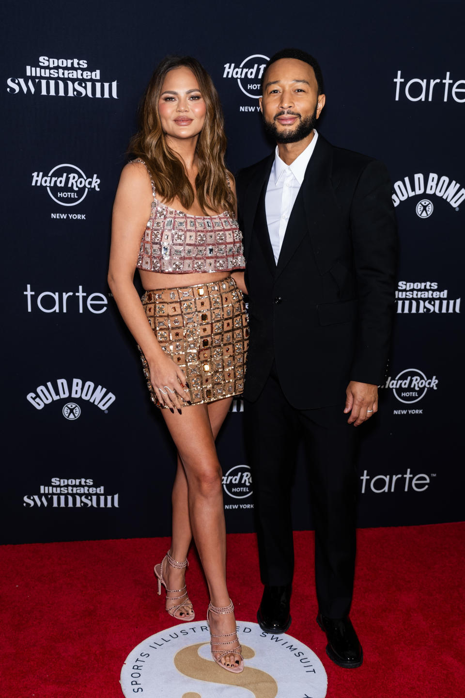 Chrissy Teigen, John Legend, sports illustrated, red carpet, paris texas, bedazzled heels, strappy stilettos, heeled sandals, sandals, men's dress shoes, patent leather,