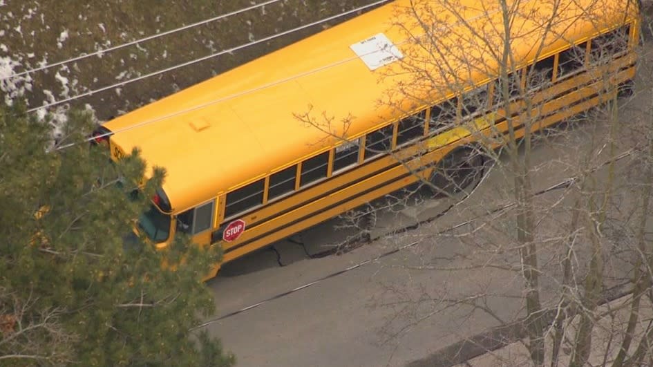 Toronto school bus trapped in sinkhole