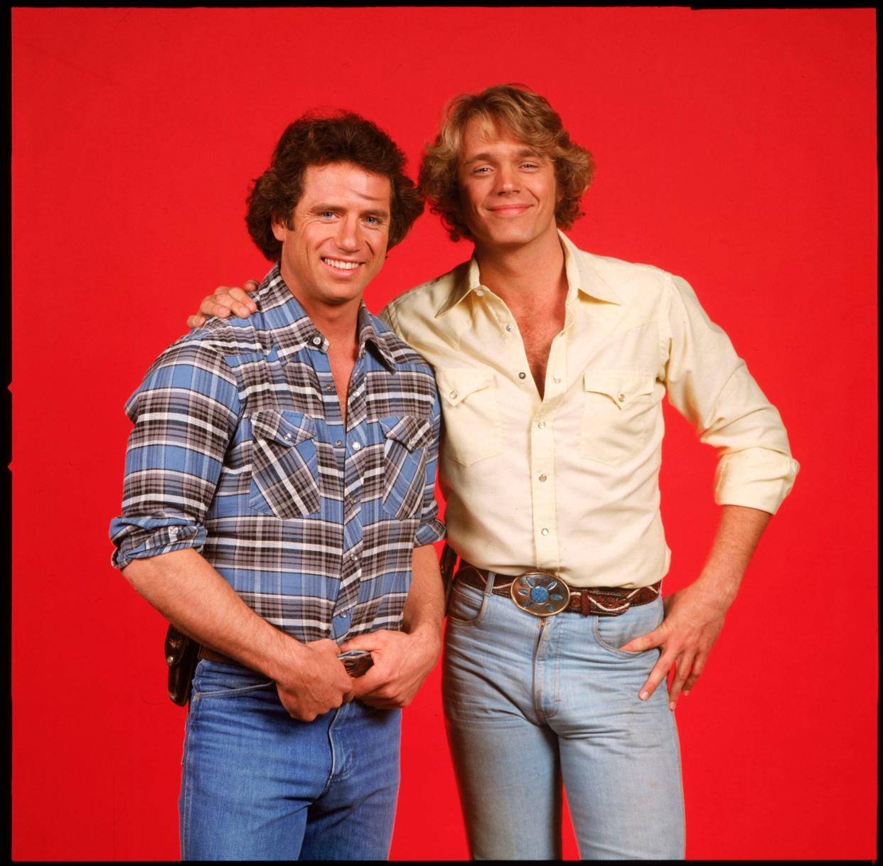 Tom Wopat, left, and John Schneider outwitted local law enforcement together on CBS' 'The Dukes of Hazzard.'
