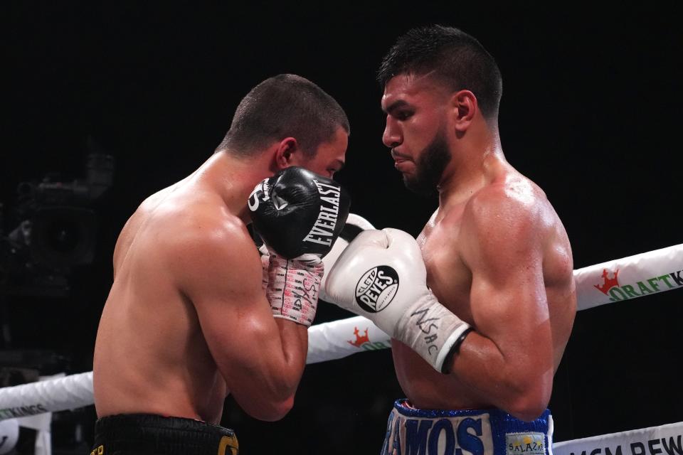 Jesus Ramos (right) and Joey Spence during their boxing bout at MGM Grand Garden Arena on March 25, 2023, in Las Vegas.