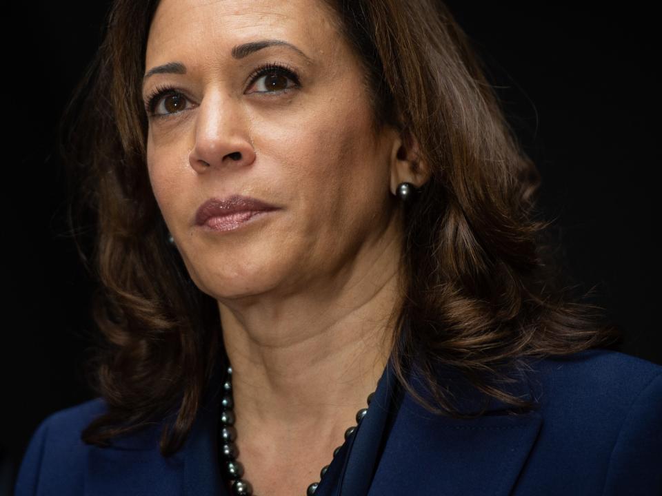 Kamala Harris, looking solemn