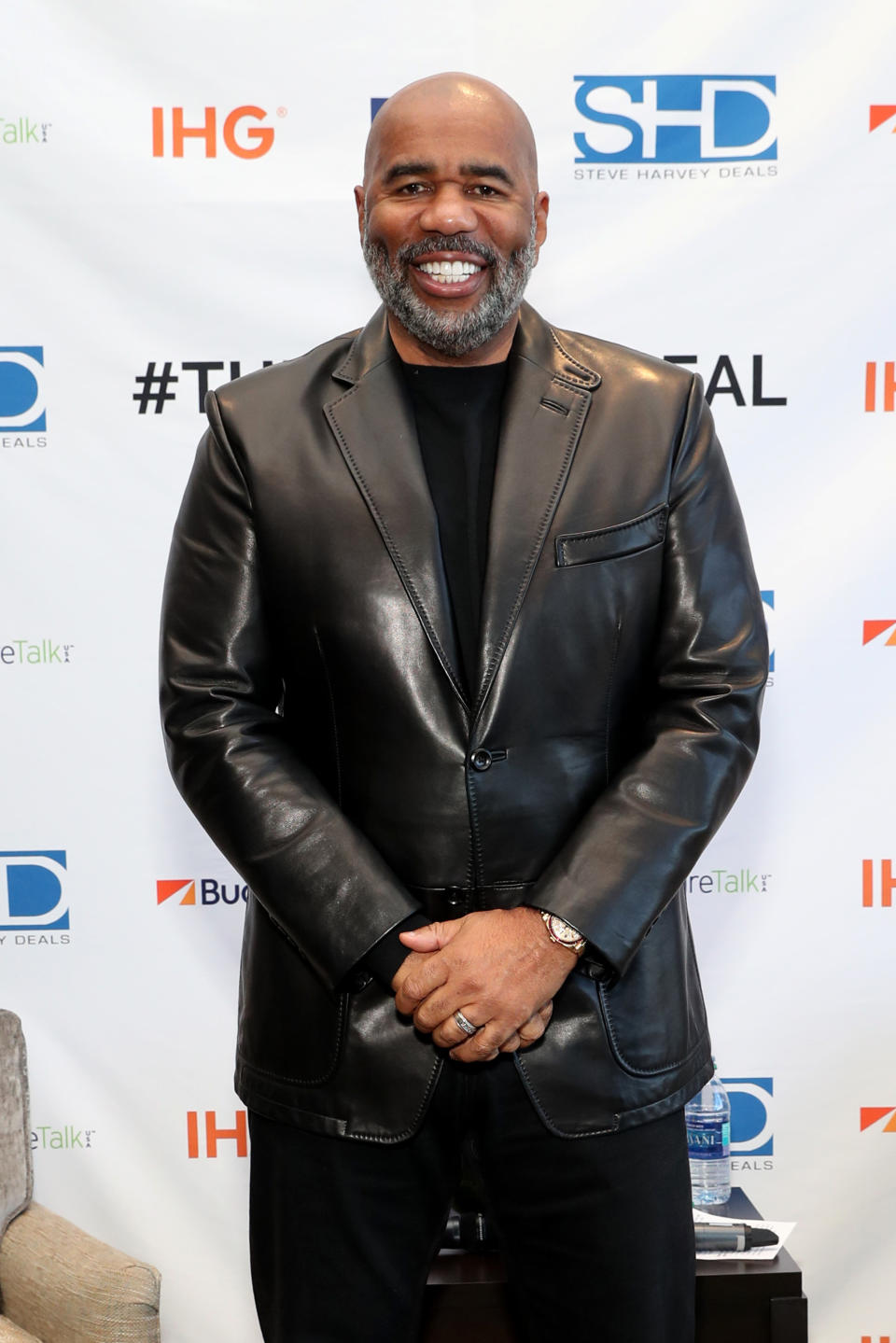 Steve Harvey smiles at an event for SteveHarveyDeals.com on February 02, 2019