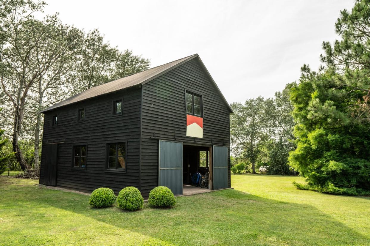 Dark Brown Barn with Upstairs Apartment