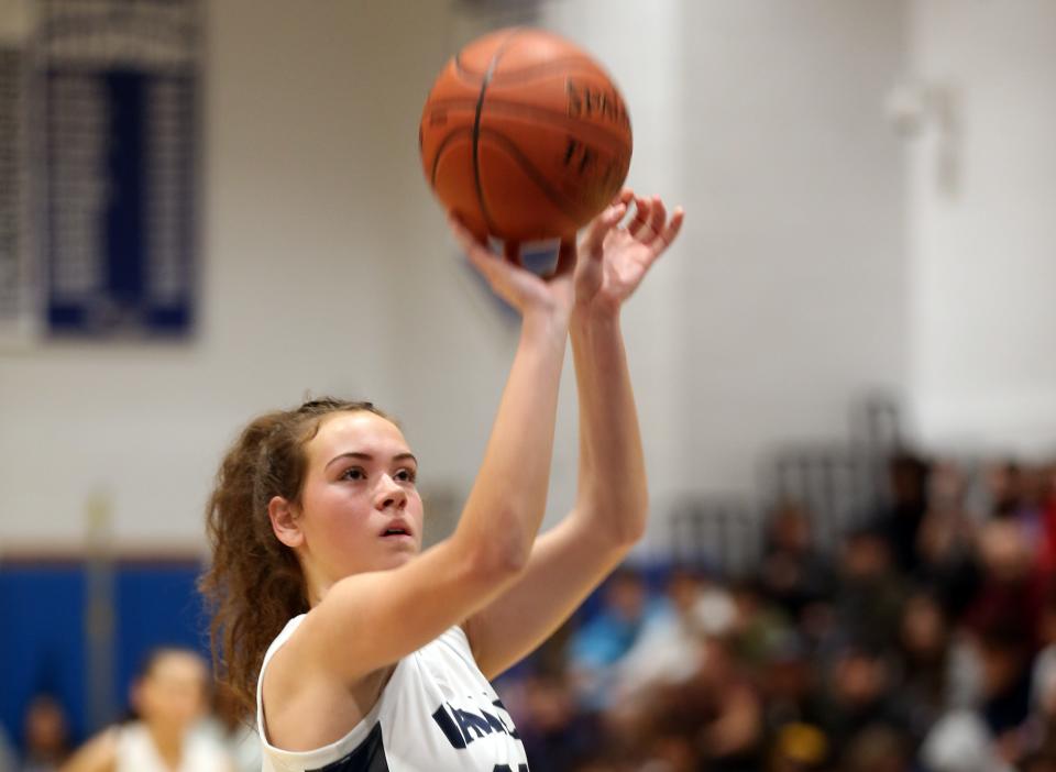 Putnam Valley's Eva DeChent (21) goes up for a shot against Haldane on her way to scoring her 2,000th point in game at Putnam Valley High School Feb. 7, 2023. 