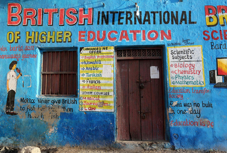 <p>A mural illustrating educational classes is seen on the outside of a building in Wabari district of Mogadishu, Somalia, June 10, 2017. (Photo: Feisal Omar/Reuters) </p>