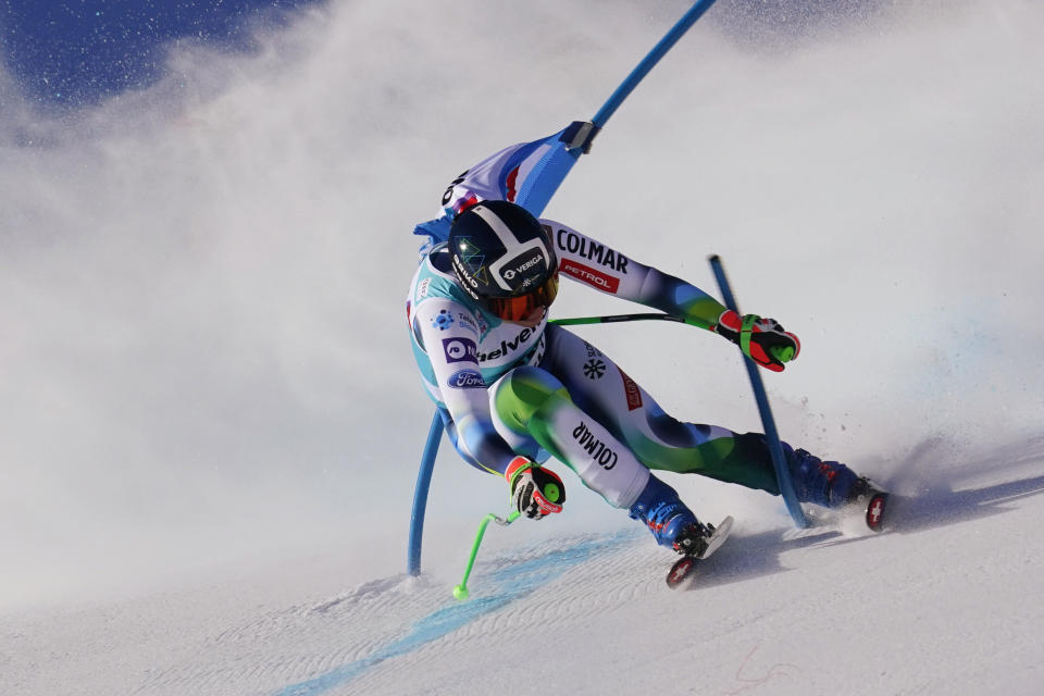 Slovenia's Ilka Stuhec crashes during an alpine ski an alpine ski, women's World Cup super-G in St. Moritz, Switzerland, Sunday, Dec. 12, 2021. (AP Photo/Marco Tacca)