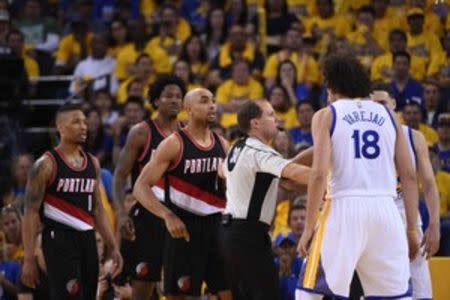May 1, 2016; Oakland, CA, USA; Portland Trail Blazers guard Gerald Henderson (9, left) argues with Golden State Warriors forward Anderson Varejao (18) during the third quarter in game one of the second round of the NBA Playoffs at Oracle Arena. Kyle Terada-USA TODAY Sports