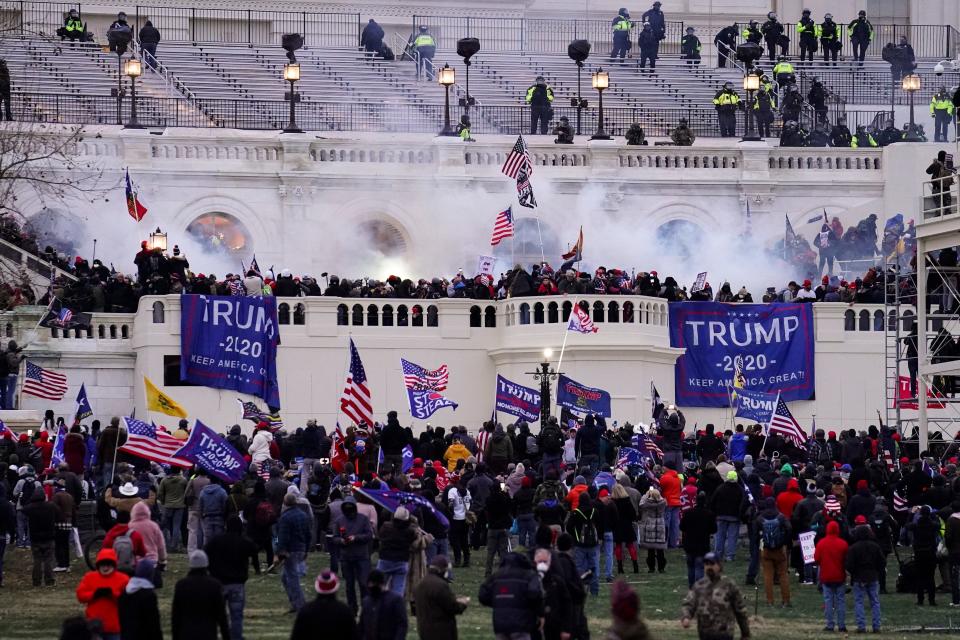 Violent insurrectionists loyal to President Donald Trump storm the U.S. Capitol, Jan. 6, 2021, in Washington.