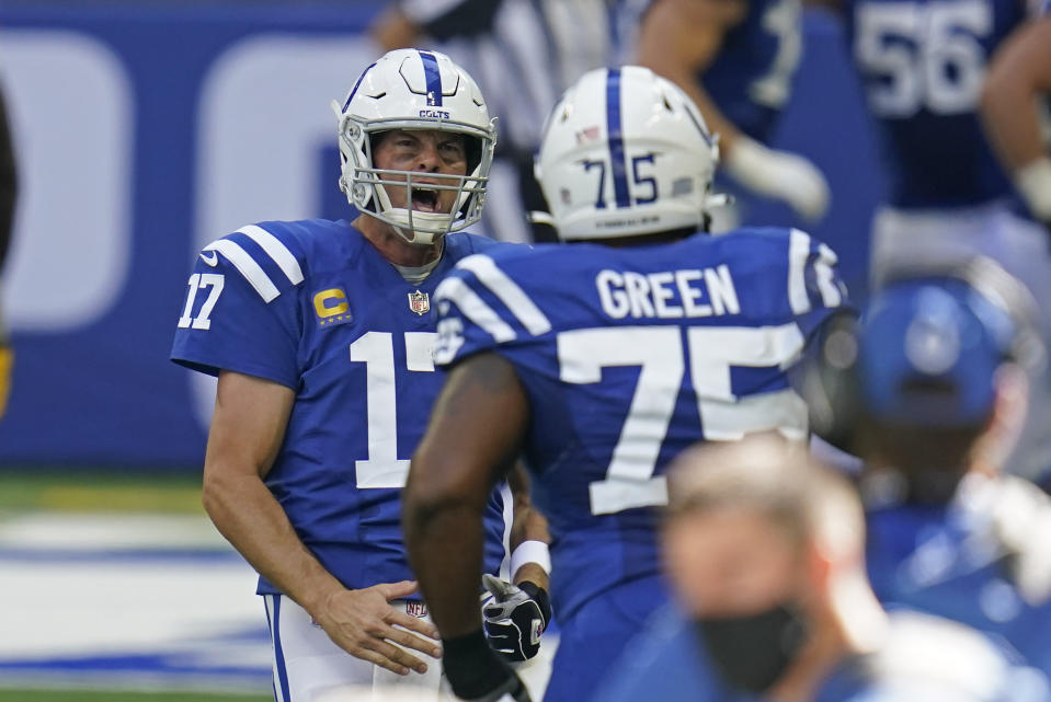 Indianapolis Colts quarterback Philip Rivers (17) reacts after throwing a touchdown pass during the second half of an NFL football game against the Minnesota Vikings, Sunday, Sept. 20, 2020, in Indianapolis. (AP Photo/Michael Conroy)