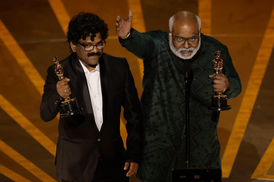 Chandrabose and MM Keeravani accept the Best Original Song award for "Naatu Naatu" from "RRR"