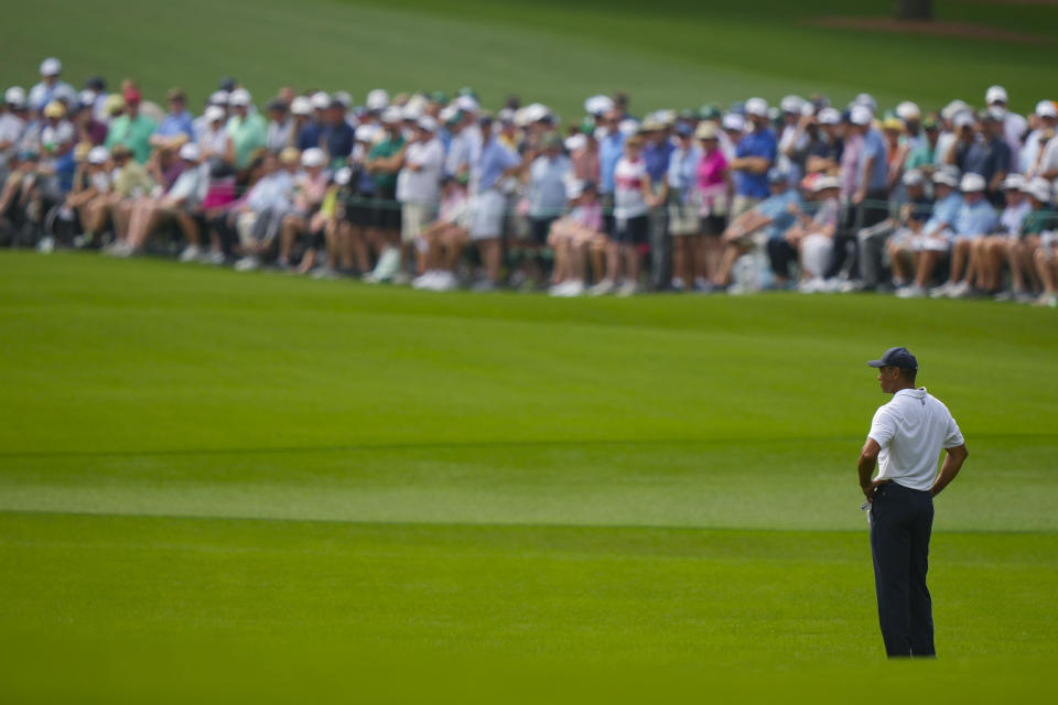 Tiger Woods waits to hit on the second hole during the first round of the Masters golf tournament at Augusta National Golf Club on Thursday, April 6, 2023, in Augusta, Ga. (AP Photo/Charlie Riedel)