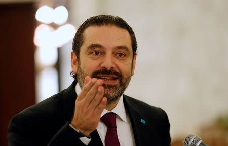 Lebanese Prime Minister-designate Saad al-Hariri gestures as he talks at the presidential palace in Baabda, Lebanon June 22, 2018. REUTERS/Mohamed Azakir