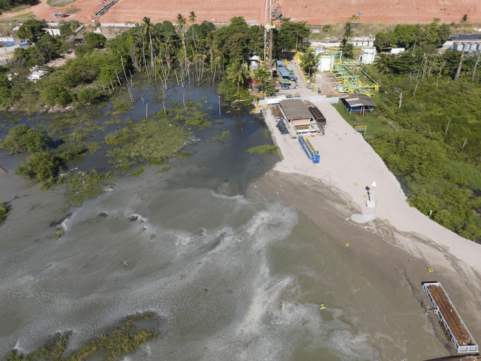 A view of sunken ground at the Mutange neighborhood in Maceio, Alagoas state, Brazil, Sunday, Dec. 10, 2023. A mine belonging to Brazilian petrochemical giant Braskem collapsed Sunday. The area had previously been evacuated and there were was no risk to any people, the authority said in its statement. (AP Photo/Itawi Albuquerque)