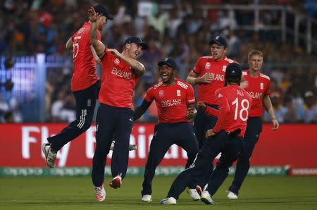 Cricket - England v West Indies - World Twenty20 cricket tournament final - Kolkata, India - 03/04/2016. England's players celebrate the dismissal of West Indies Chris Gayle. REUTERS/Adnan Abidi