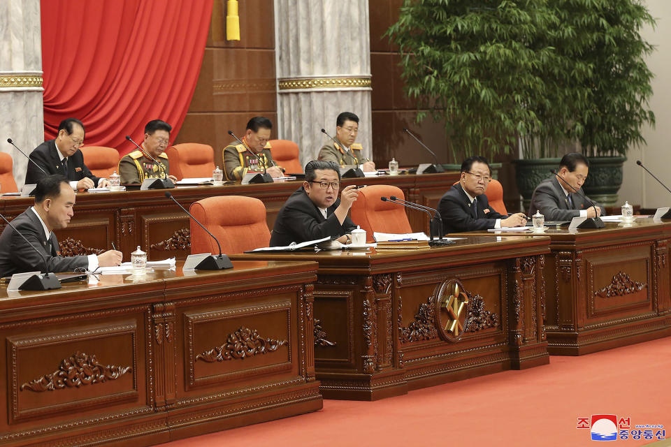 In this photo taken during Dec. 27 - Dec. 31, 2021 and provided on Saturday, Jan. 1, 2022 by the North Korean government, North Korean leader Kim Jong Un, center, attends a meeting of the Central Committee of the ruling Workers’ Party in Pyongyang, North Korea. Independent journalists were not given access to cover the event depicted in this image distributed by the North Korean government. The content of this image is as provided and cannot be independently verified. Korean language watermark on image as provided by source reads: "KCNA" which is the abbreviation for Korean Central News Agency. (Korean Central News Agency/Korea News Service via AP)