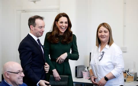 The Duchess of Cambridge meets staff during her visit to a new national support line at the charity, Family Action - Credit: WPA pool