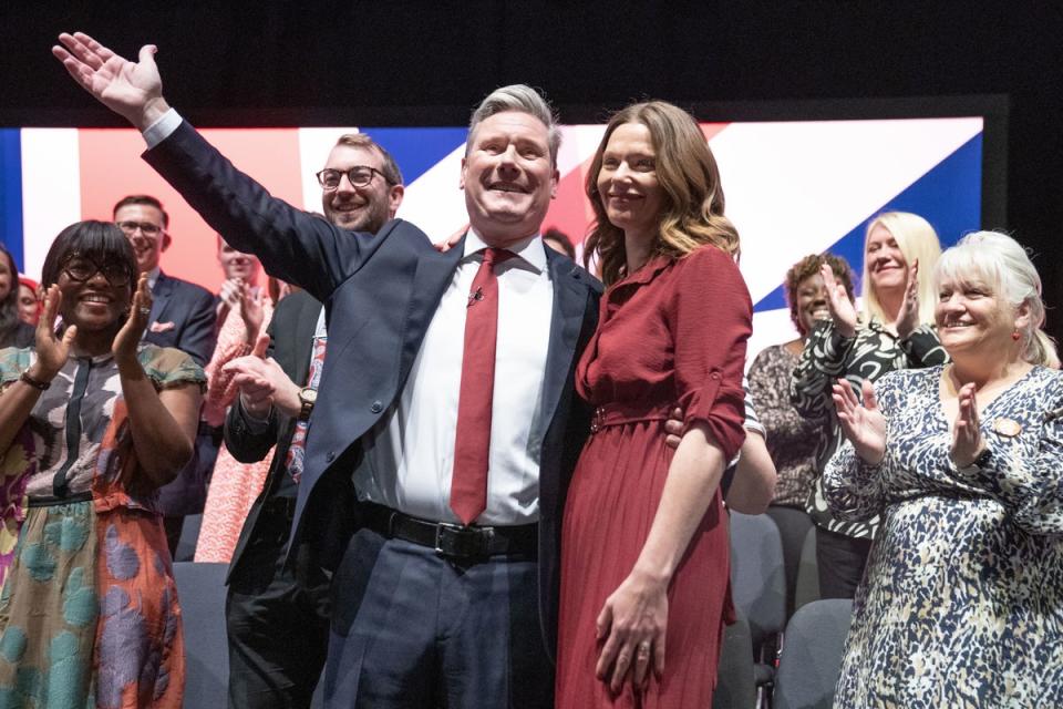 Sir Keir is joined on stage by his wife after delivering his keynote speech to the Labour Party Conference in Liverpool on Tuesday (Stefan Rousseau/PA)
