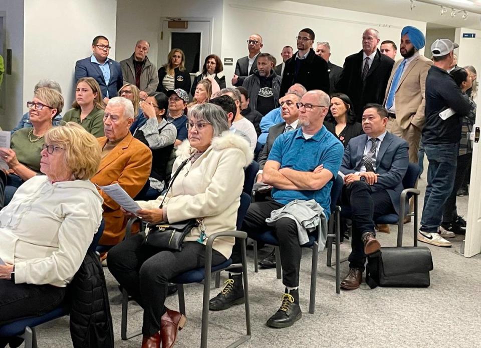 An overflow crowd protests a plan to house 84 mentally ill people to the City Council in Turlock CA on Feb. 13, 2024.