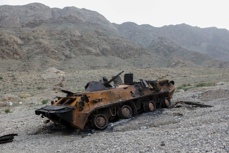 FILE PHOTO: A view shows a burnt armoured vehicle of Kyrgyz forces near a water distribution facility in Batken province