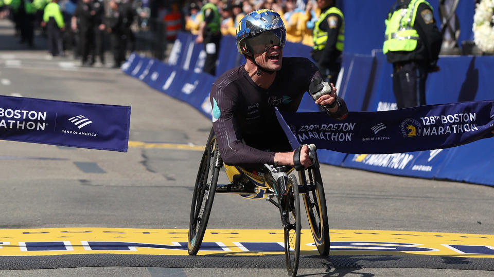 Marcel Hug of Switzerland crosses the finish line to win the Men's Wheelchair Division at the 128th Boston Marathon on April 15, 2024 in Boston, Massachusetts. / Credit: Paul Rutherford / Getty Images