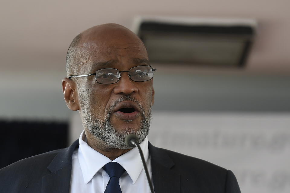 Ariel Henry speaks during his appointment as the new Prime Minister in Port-au-Prince, Haiti, Tuesday, July 20, 2021, weeks after the assassination of President Jovenel Moise at his home. (AP Photo/Matias Delacroix)