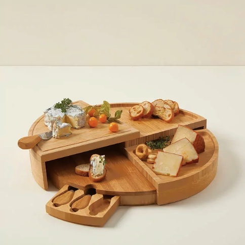 19) Compact Swivel Cheese Board with Knives