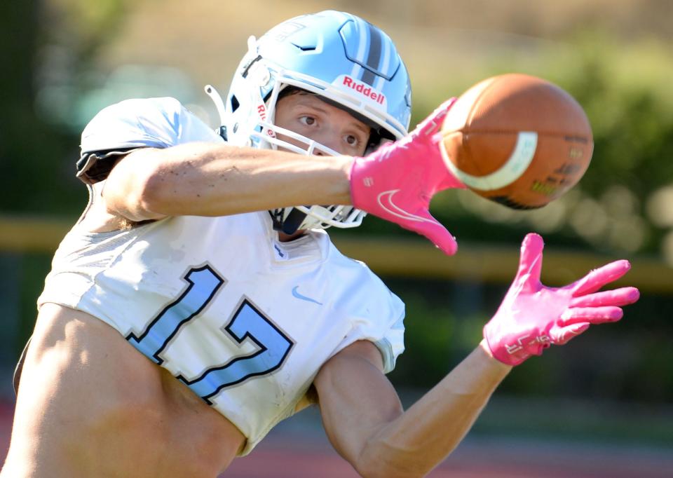 River Stout catches a pass during a Moorpark College football practice on Tuesday, Aug. 29, 2023. The Raiders open their season against Palomar at home Saturday at 6 p.m.
