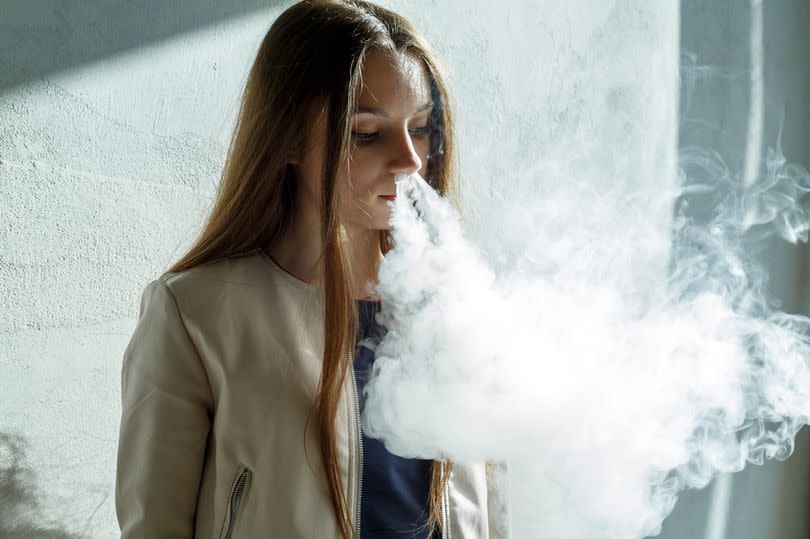 Young girl vaping