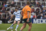 Argentina's Emiliano Boffelli kicks the ball during a rugby championship match against Australia, in Mendoza, Argentina, Saturday, Aug. 6, 2022. (AP Photo/Gustavo Garello)