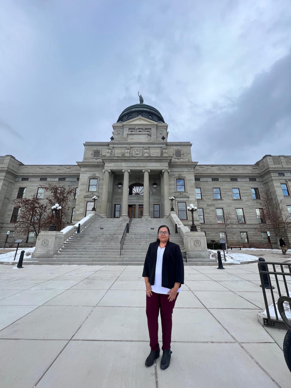 Ronnie Jo Horse, executive director of Western Native Voice, in front of the Montana State Capitol Building in Helena.